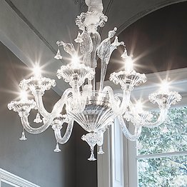 White and crystal chandelier at eight lights