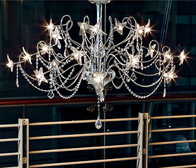 Modern chandelier with flowers, white color