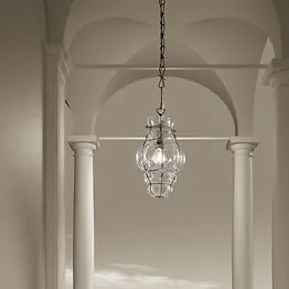 Lantern in amber color with rough steel finishes